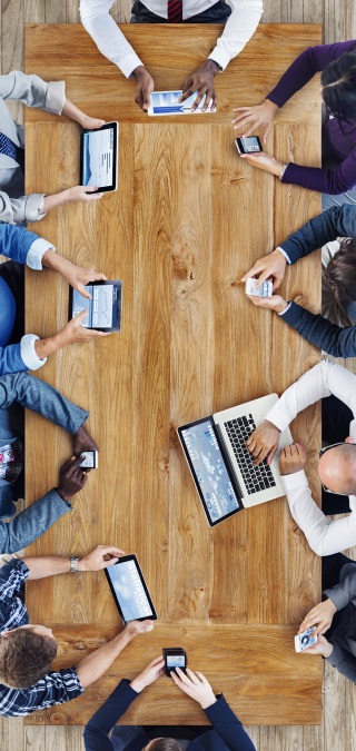 Group of Business People Using Digital Devices Group of Business People Using Digital Devices